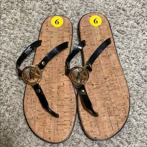New never worn MK flip flops size 9